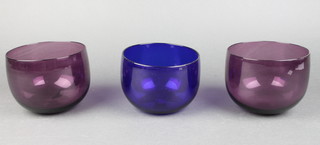 A pair of 19th Century purple glass finger bowls 5" and a Bristol blue glass ditto 