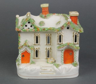A 19th Century Staffordshire pastel burner in the form of a cottage 5 1/2" 