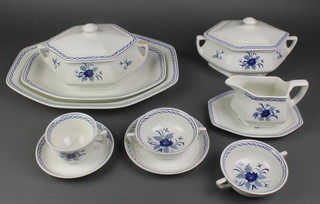 A 95 piece Adams dinner/tea service comprising 2 graduated meat plates, 3 twin handled tureens and covers, 2 sauce boats and stands, 2 oval dishes, 12 dinner plates (1 chipped), 12 side plates (1 chipped), 12 bowls, 12 twin handled soup bowls and saucers, 12 tea cups and 12 saucers 