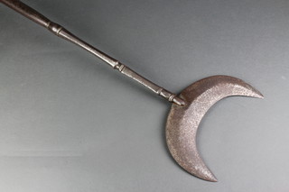 A 19th Century Indo Persian crescent shaped axe/processional staff with faceted shaft 