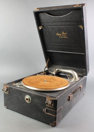 A Mayfair Super Model portable manual gramophone contained in a black fibre carrying case 