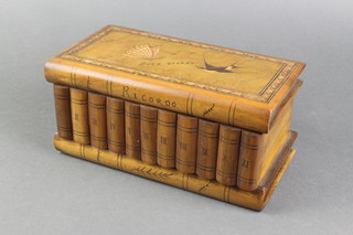 A rectangular Continental trinket box in the form of 11 books with hinged rising lid 4" 