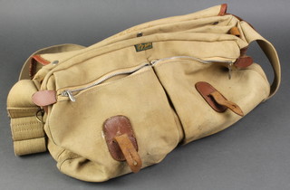 A Brady cloth and leather fishing bag 