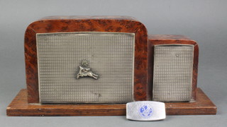 An Art Deco figured walnut and white metal mounted cigarette dispenser together with a paper knife marked the crest of Nato 