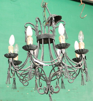 A verdigris green metal 8 light electrolier with rope decoration 