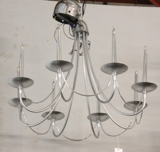 A "Designer" polished steel 8 light electrolier 