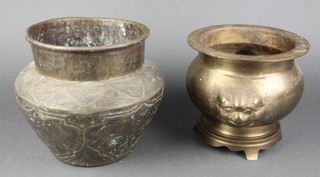 A Indian embossed circular brass jardiniere 7" together with a Chinese twin handled brass jardiniere 