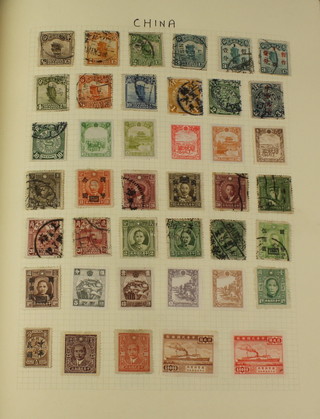 An album of various mint and used World stamps including Abyssinia, Argentina, Austria, Belgium, Brazil, Chile, China, Germany, French Colonies, Italy, Japan, Russia