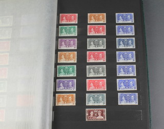 A stock book of various George VI and later Commonwealth mint stamps - Aidan, Bahamas, Gold Coast, New Zealand, Newfoundland, Sierra Leone, Gold Coast, St Vincent 