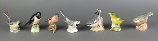 5 Beswick figures of birds - Nuthatch 2413, Chaffinch 991, Greenfinch 2105, Grey Wagtail 1041 and Stonehatch 2274 together with a Goebel figure of a bird and a Royal Worcester figure of a Nuthatch 3334