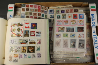 An album of used Polish stamps and various sheets of stamps