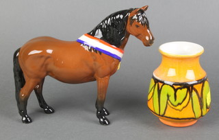 A Beswick figure of a standing bay horse - Arthur Burch 6 1/2" together with a Poole Pottery atomic orange waisted shaped vase 3 1/2"  