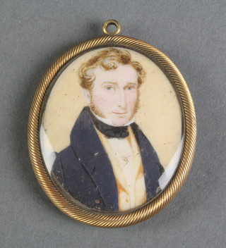 A 19th Century portrait miniature of a whiskered gentleman wearing a blue coat, 2" oval, contained in a gilt metal mount and with ebonised frame 