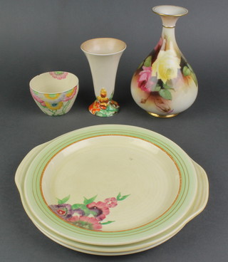 A Worcester club shaped vase decorated roses 7" (chip to base), a Susie Cooper plate with geometric designs 9", 2 Clarice Cliff plates 9" (crazed) , a ditto sugar bowl decorated flowers (chipped and cracked) 2 1/2" and a Carlton Ware trumpet shaped vase 5" 