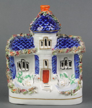 A 19th Century Staffordshire flat back cottage with swans supporting the doorway 6 1/2"h 