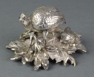 A Christofle silver plated model of a turkey on a raised rustic base 4"  