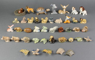 34 various Wade Whimsies, a Wade ashtray, do. trinket box in the form of a tortoise and 7 figures of animals