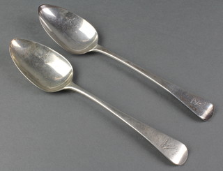 A George III silver Old English table spoon, London 1803, a ditto London 1807 