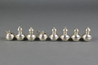 A silver 8 piece condiment set of bulbous form comprising 3 salts, 3 peppers and 2 mustards 2", London 1916/1918, 92 grams