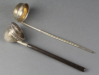 A Continental pierced silver infuser with ebony handle, a silver plated ladle 