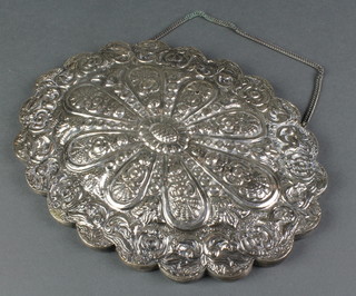 A Persian repousse silver oval mirror with chain 8 1/4" 