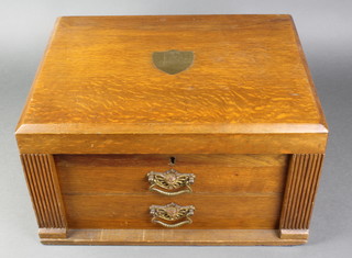 An Edwardian oak 2 drawer canteen with fitted lid 