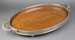 An Edwardian oak and silver plated mounted 2 handled tray 42 1/2"  