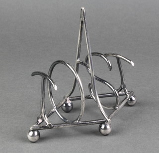 A novelty Art Deco silver plated toast rack spelling out the word Toast, on ball feet 
