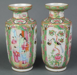 A pair of 19th Century Canton famille rose club shaped vases decorated courtly figures 9"