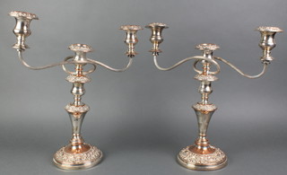 A pair of ex plated 3 light candelabra with repousse decoration 14" 