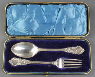 A cased Victorian silver fork and spoon, London 1861, 62 grams