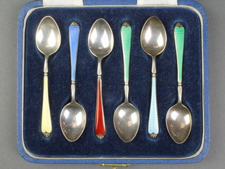 A cased set of 6 silver and guilloche enamel coffee spoons London 1957 