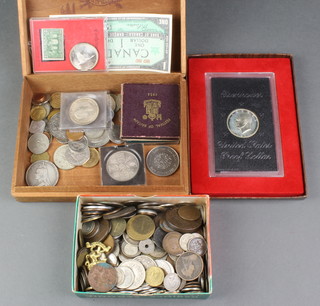 A cased 1971 proof Eisenhower dollar, minor UK and foreign coins and crowns 