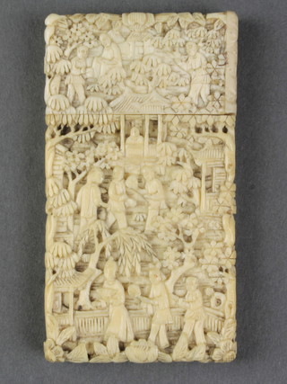 A 19th Century carved Cantonese ivory card case with an extensive landscape view with figures in gardens and pavilions 3 1/4" x 1 3/4"