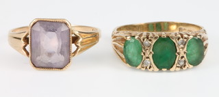 A 9ct yellow gold emerald and diamond ring, size P together with a 9ct amethyst ring size O 1/2