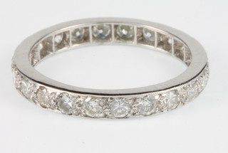 An 18ct white gold full eternity ring, approx. 1.25ct, size M 