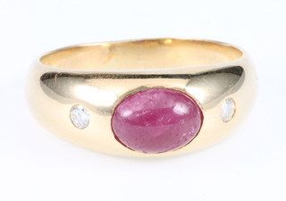 An 18ct cabuchon ruby and diamond gypsy ring, size P