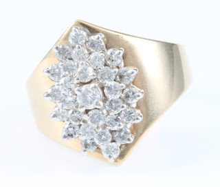 A 14ct yellow gold diamond cluster ring comprising 29 brilliant cut stones, size L