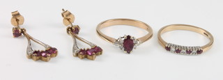 A 9ct yellow gold ruby and diamond ring size M, a gem set ring size M and a pair of earrings 