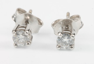 A pair of 18ct white gold diamond ear studs, approx 0.43ct 