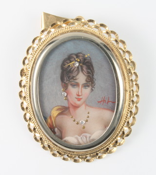 An 18ct yellow gold diamond set portrait miniature pendant brooch 