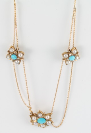An antique yellow gold turquoise and seed pearl triple cluster necklace