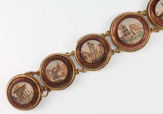 A 19th Century gold and micro mosaic 7 plaque bracelet with ruin scenes 