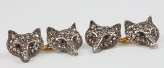 A pair of gold diamond and ruby double fox head cufflinks