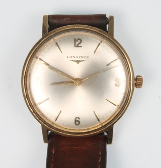 A gentleman's 9ct gold Longines wristwatch with leather strap 