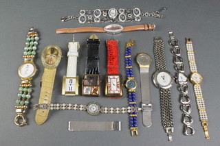 A quantity of lady's fashion wristwatches 