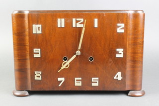 Wurttemberg, an Art Deco striking mantel clock with Arabic numerals, contained in a walnut case 
