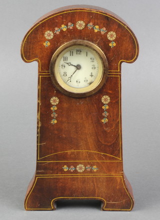 An Edwardian Art Nouveau bedroom timepiece with enamelled dial and Roman numerals contained in a shaped and painted mahogany case 