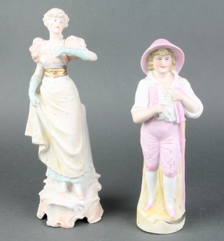 2 Victorian biscuit porcelain figures of standing farm boy 8 1/2" and standing lady 10" 