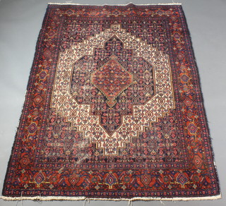 An Antique Persian Senneh blue and white ground rug with central diamond medallion 76" x 52" 